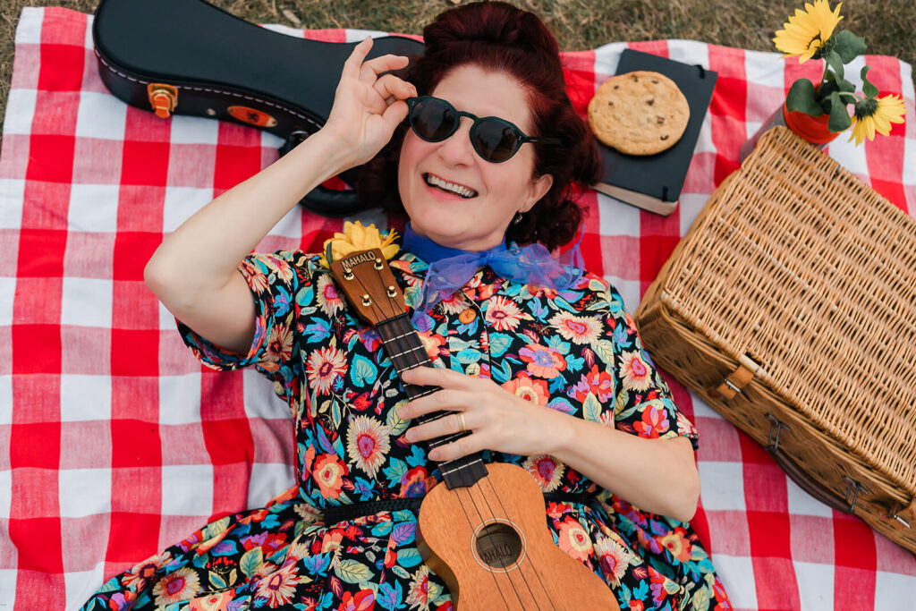 A fun picnic blanket vibe for an adult facing audience with Beth Portman music in Edmonton for her visual identity